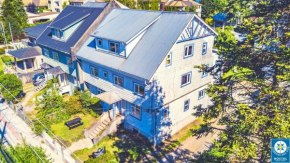 Отель Hostal Compass del Sur  Пуэрто-Варас